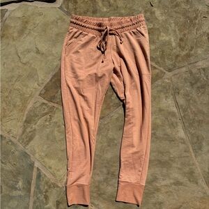 NWT Free people movement joggers in orange